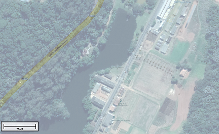Partially transparent satellite image over a street map.